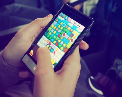 Large smartphone screen showing a fictional adventure game