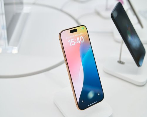 Smartphones displaying fictional mobile games at a technology exhibition